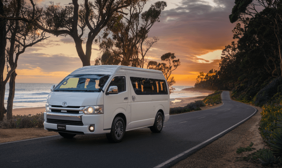 A Toyota HiAce campervan on a Western Australian road.