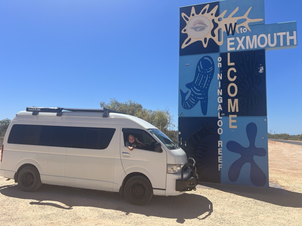 Abi off-grid Toyota Hiace campervan at coastal camp