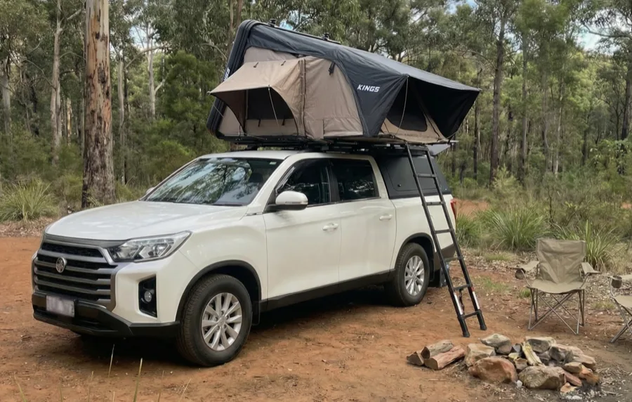 offgrid wanderer 2.0 at campspot with tent open.png